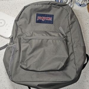 Jansport Superbreak Gray Backpack with Padded Straps and Durable Fabric